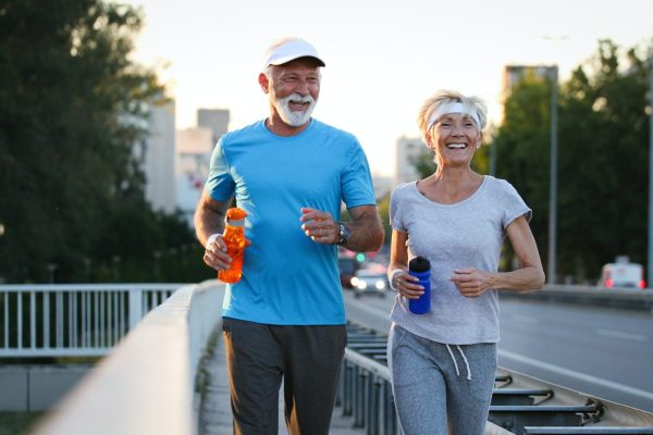 healthy-senior-couple-jogging-in-the-city-at-early-morning-with-sunrise.jpg
